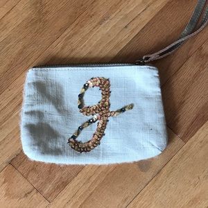 g initial wristlet never used